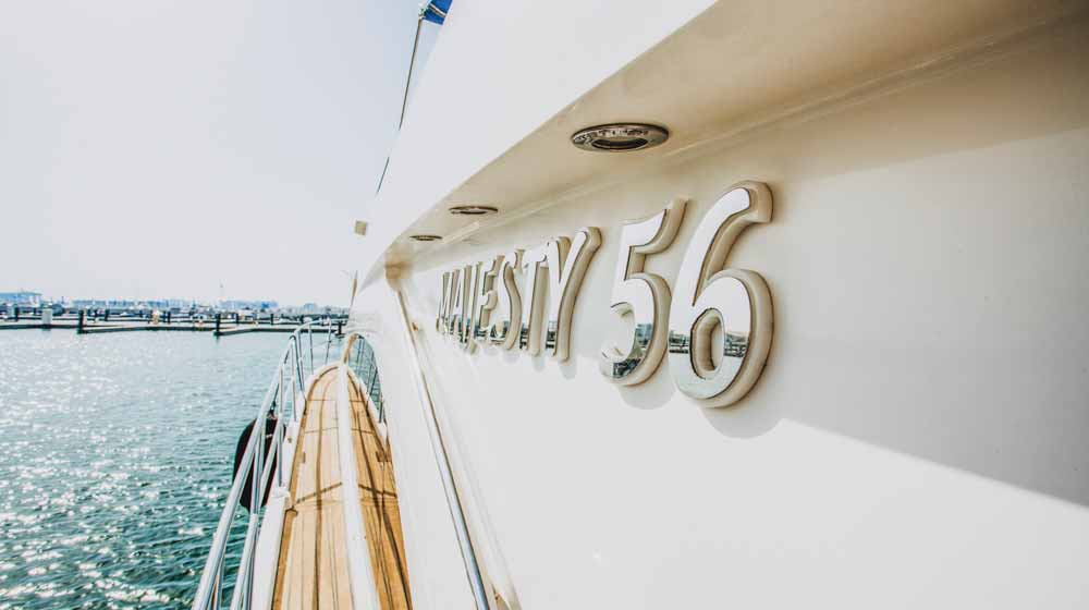 luxury yacht fleet lagoona cruising near exclusive hotel burj al arab in dubai